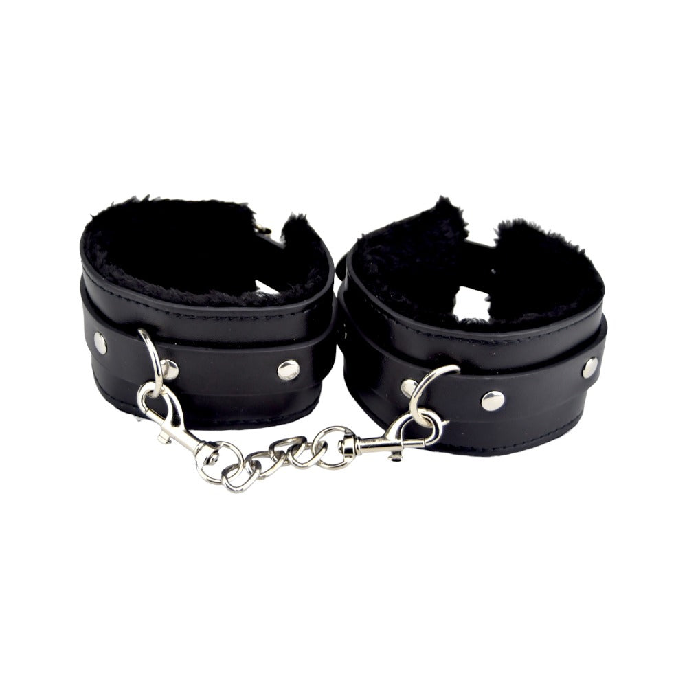 Black furry plush wrist cuffs from Bound to Please bondage restraints set, soft and comfortable for intimate restraint play.