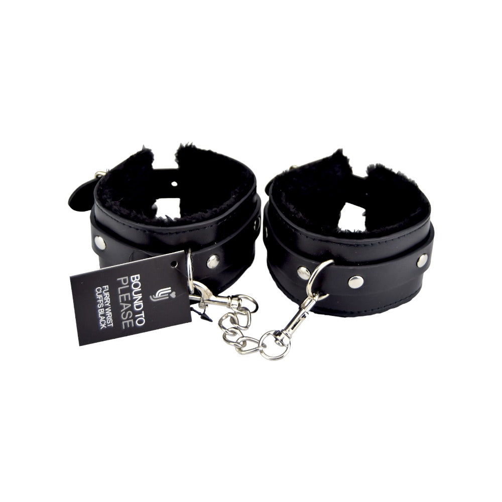 Black furry plush wrist cuffs from Bound to Please bondage restraints set, featuring soft, padded material for comfortable wear.