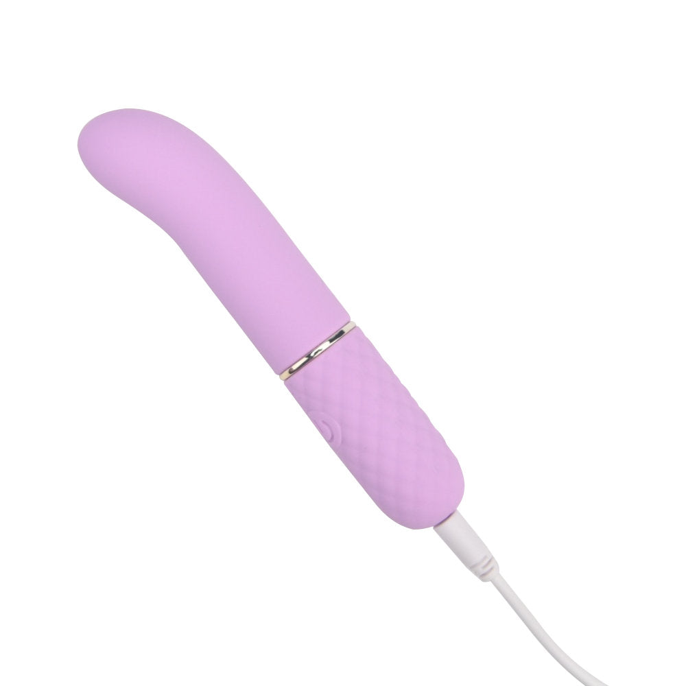 NAUTI Petites 10-speed G-spot vibrator charging, compact adult pleasure toy with multiple vibration settings.