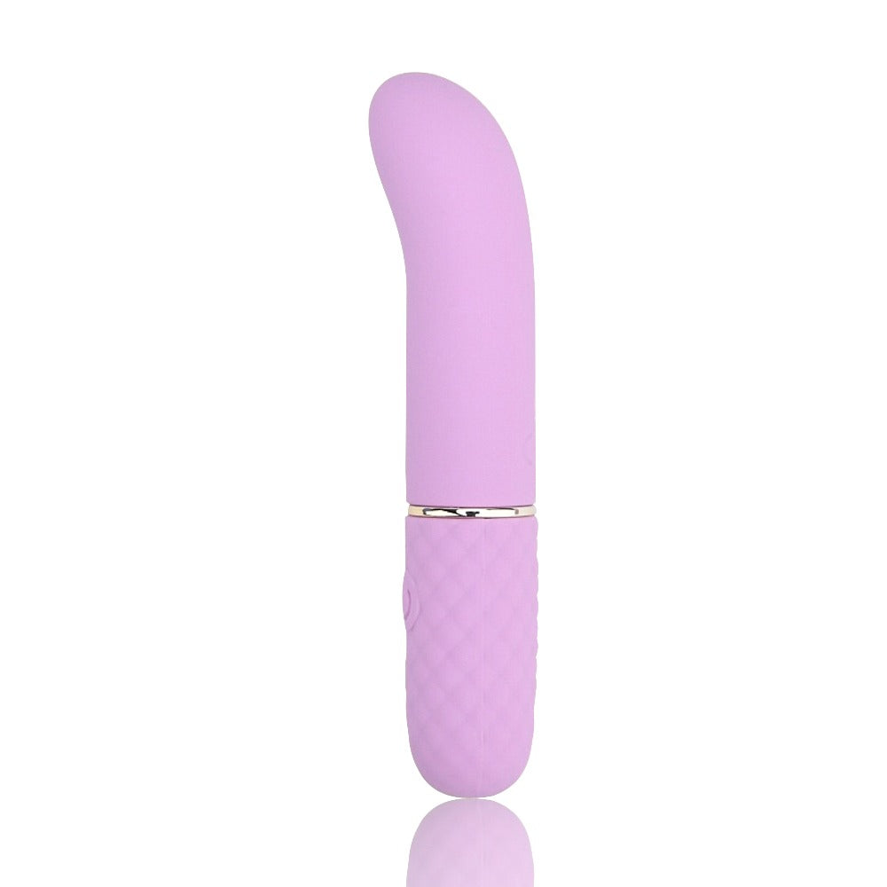 NAUTI Petites 10-speed G-spot vibrator with sleek design, shown on mirror, designed for targeted pleasure and personal intimacy.