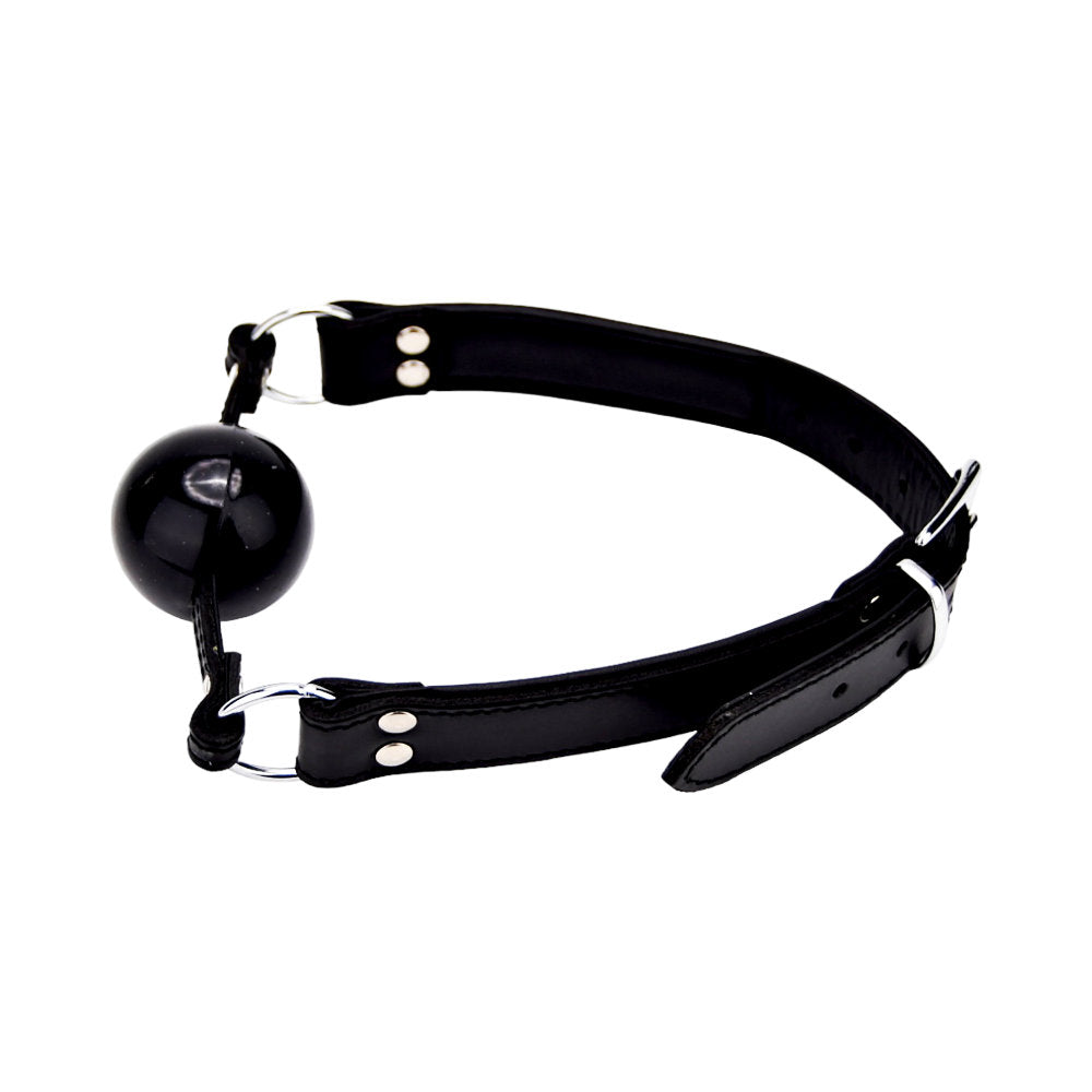 Bound leather solid ball gag with a smooth finish and adjustable straps, ideal for BDSM play and sensory experiences.