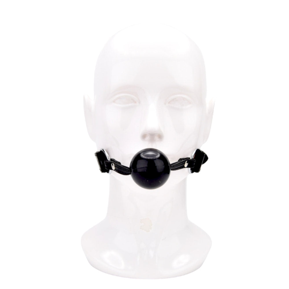Bound leather solid ball gag with adjustable straps, featuring a smooth, round ball for comfortable restraint.