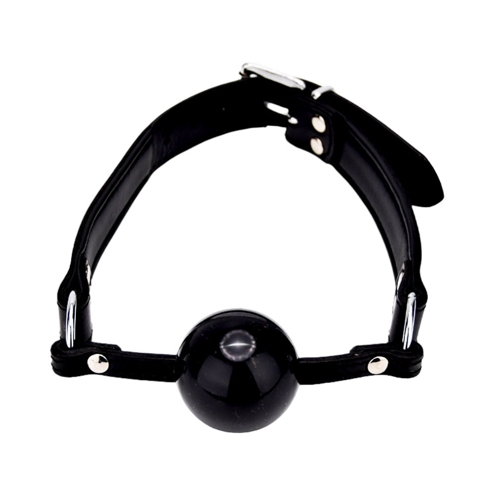 Bound leather solid ball gag with a smooth finish and adjustable strap, designed for comfortable wear during BDSM play.
