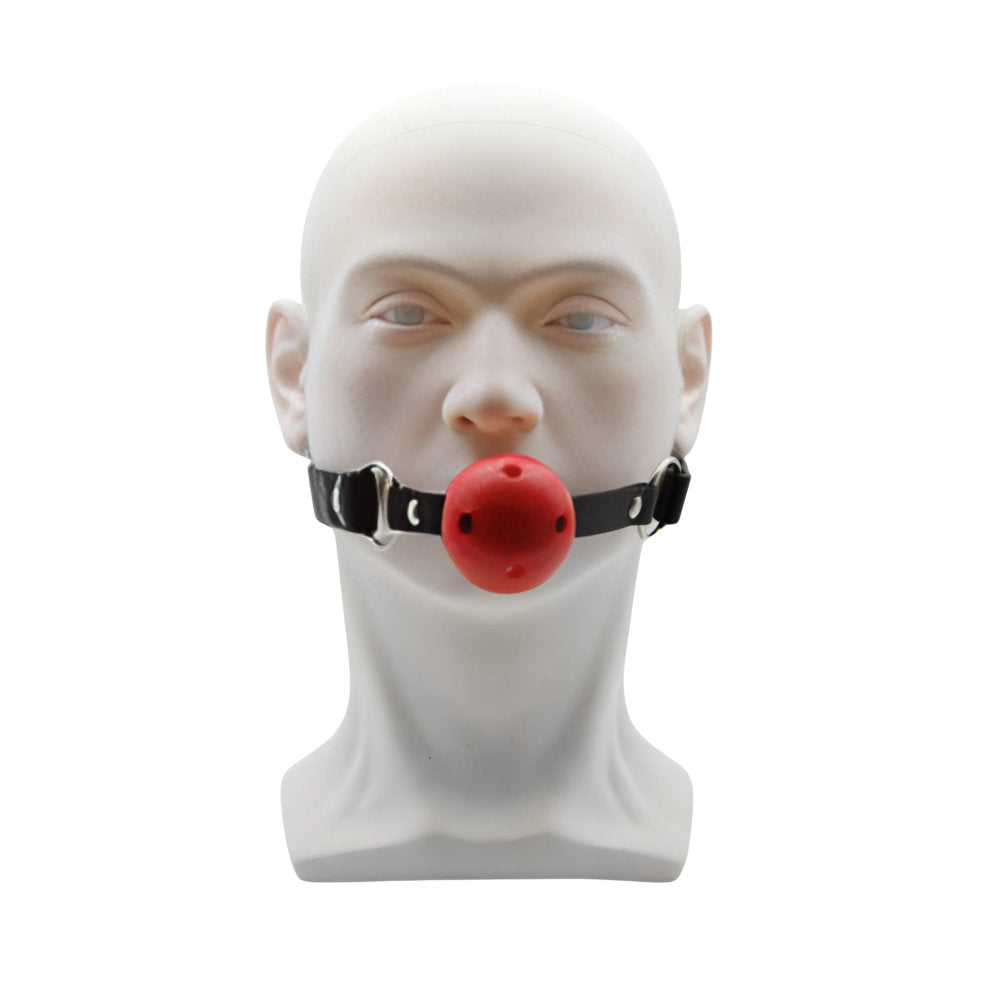 Red breathable ball gag from Bound to Play, featuring adjustable straps and secure fit for BDSM restraint play.