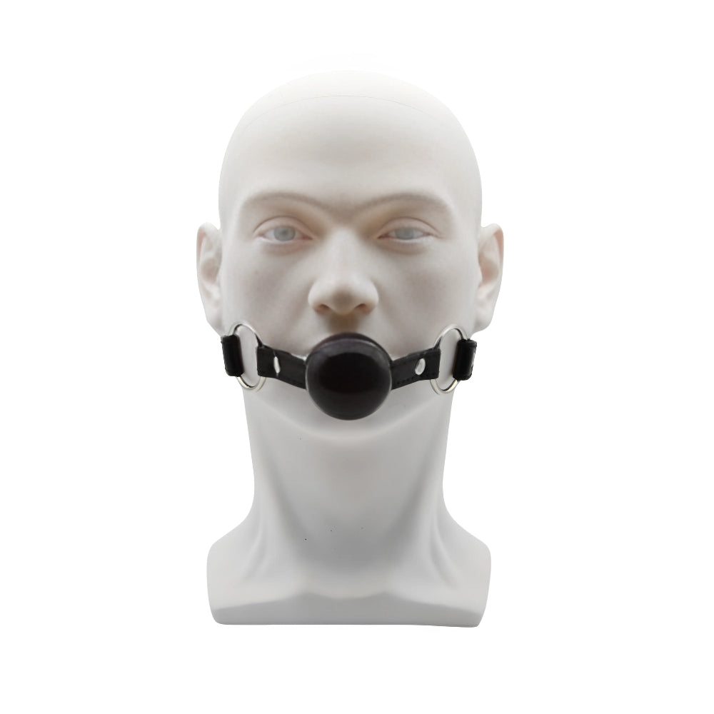 Bound to Play silicone ball gag showing the black silicone ball and adjustable strap for restraint and control.