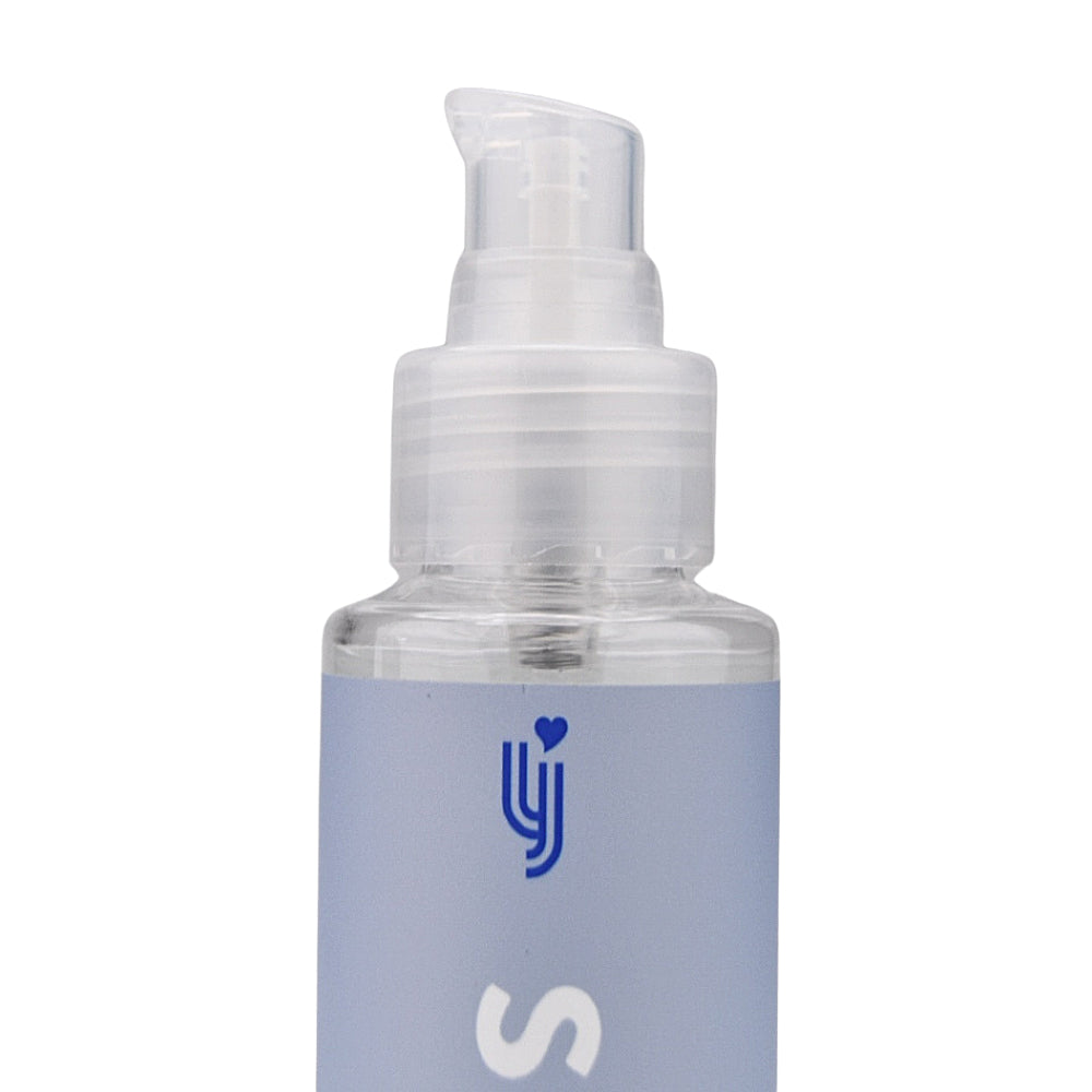 Loving Joy Slide water-based lubricant in a 500ml pump bottle, showcasing its clear, smooth texture and easy dispensing.