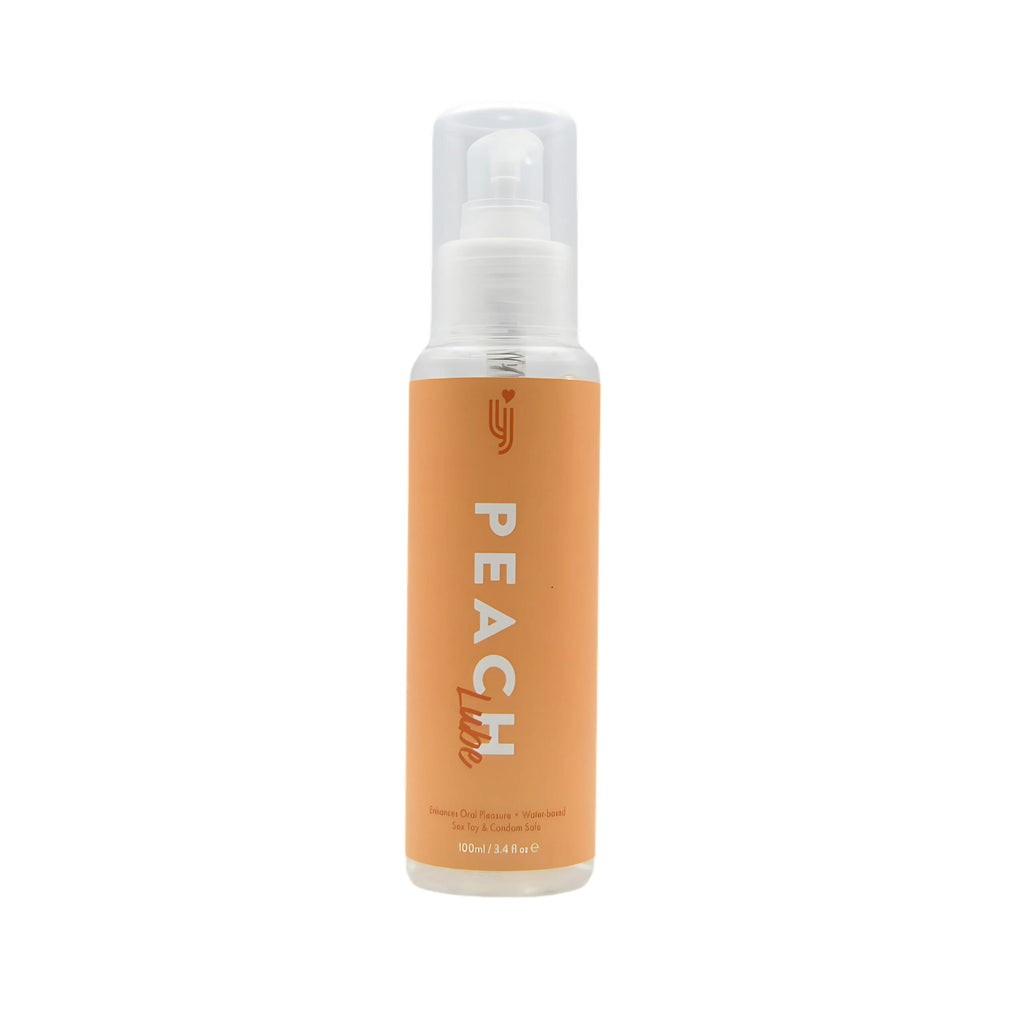 Loving Joy Peach-flavored lubricant in a 100ml bottle, with the product label visible, designed for enhanced intimacy and comfort.