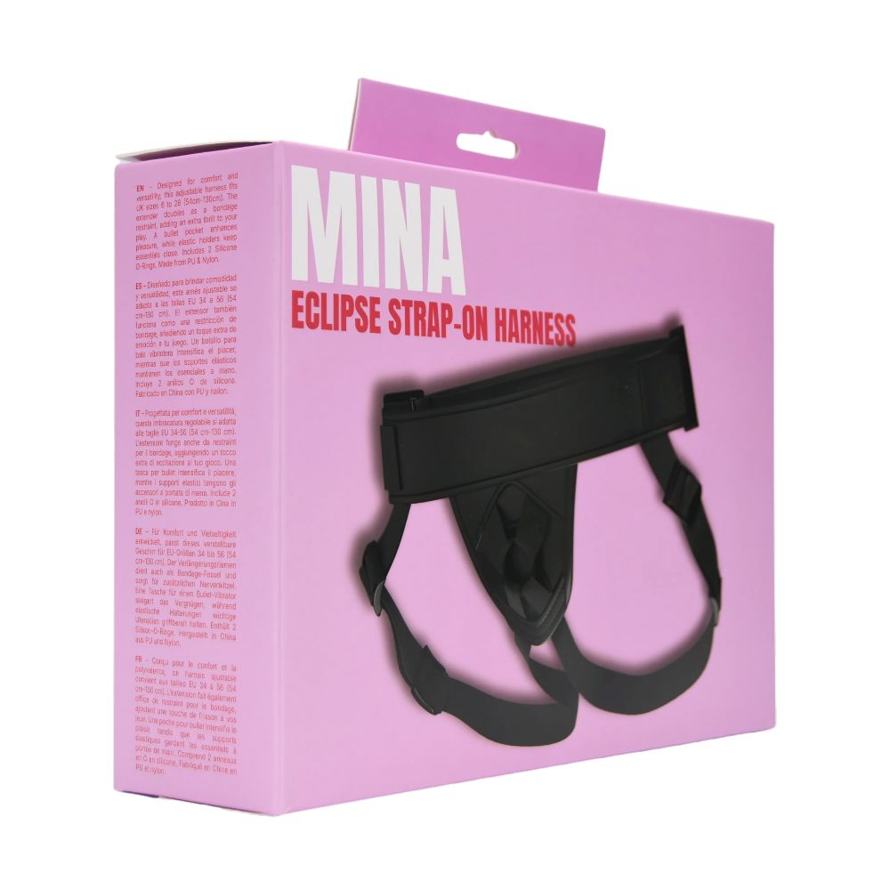 MINA Eclipse strap-on harness with adjustable straps and black design, shown on a model for secure fit and comfort.