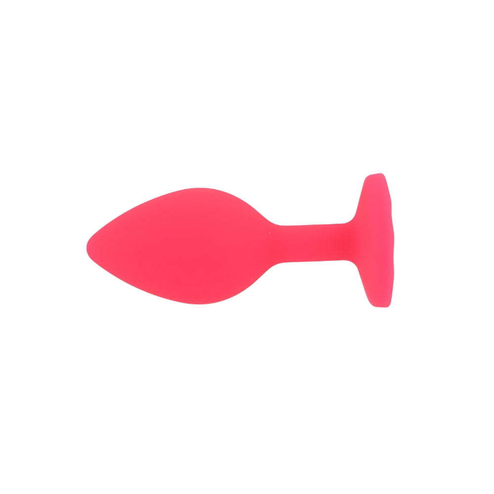 Small pink silicone butt plug from Toosh, featuring a smooth design for comfortable use and easy handling.