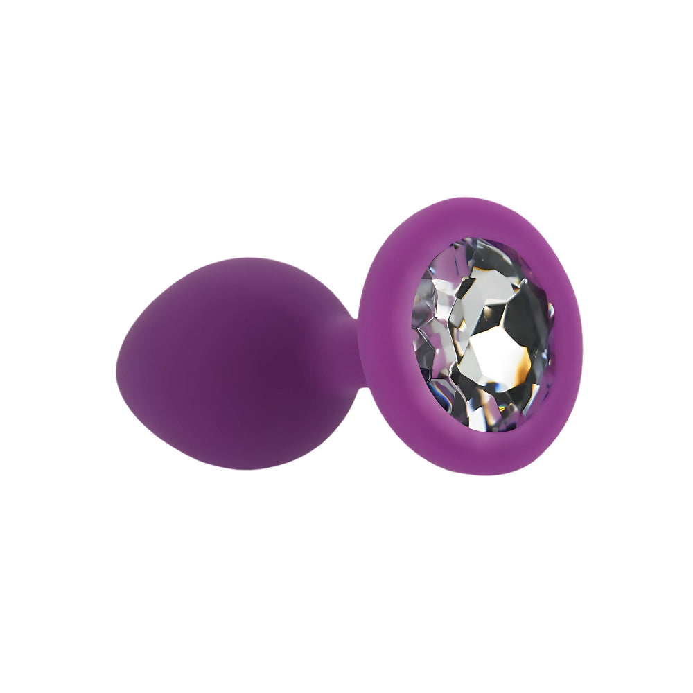 Small purple silicone butt plug by Toosh, featuring a smooth, tapered design for comfortable insertion and secure wear.