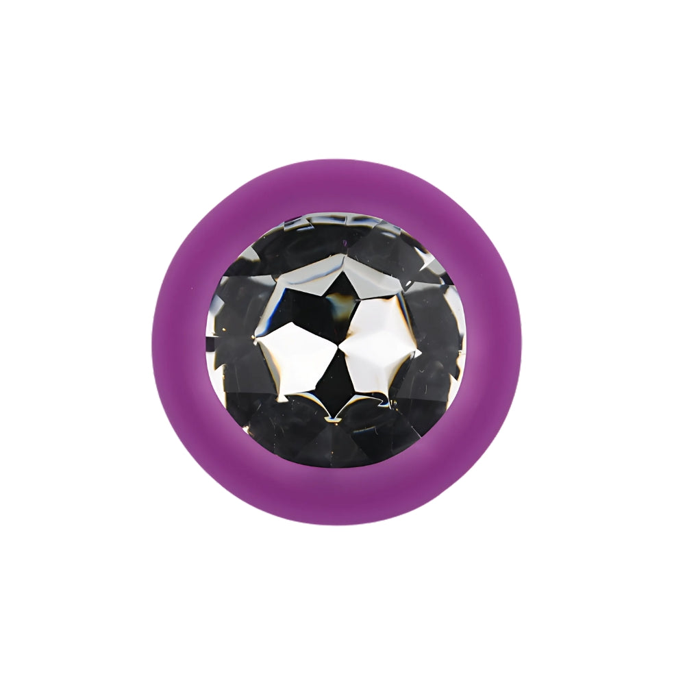 Small purple silicone butt plug from Toosh, designed for comfortable insertion and smooth texture, ideal for beginners.