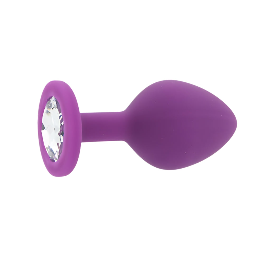 Toosh Purple Silicone Butt Plug Medium, smooth and tapered for comfortable wear, shown in packaging.