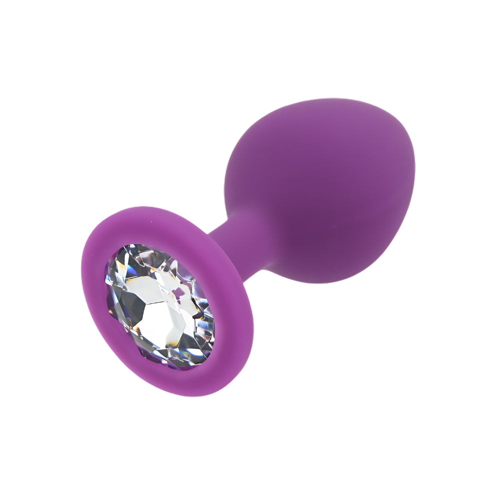 Purple silicone butt plug by Toosh, medium size, with smooth, tapered design suitable for comfortable wear and easy insertion.