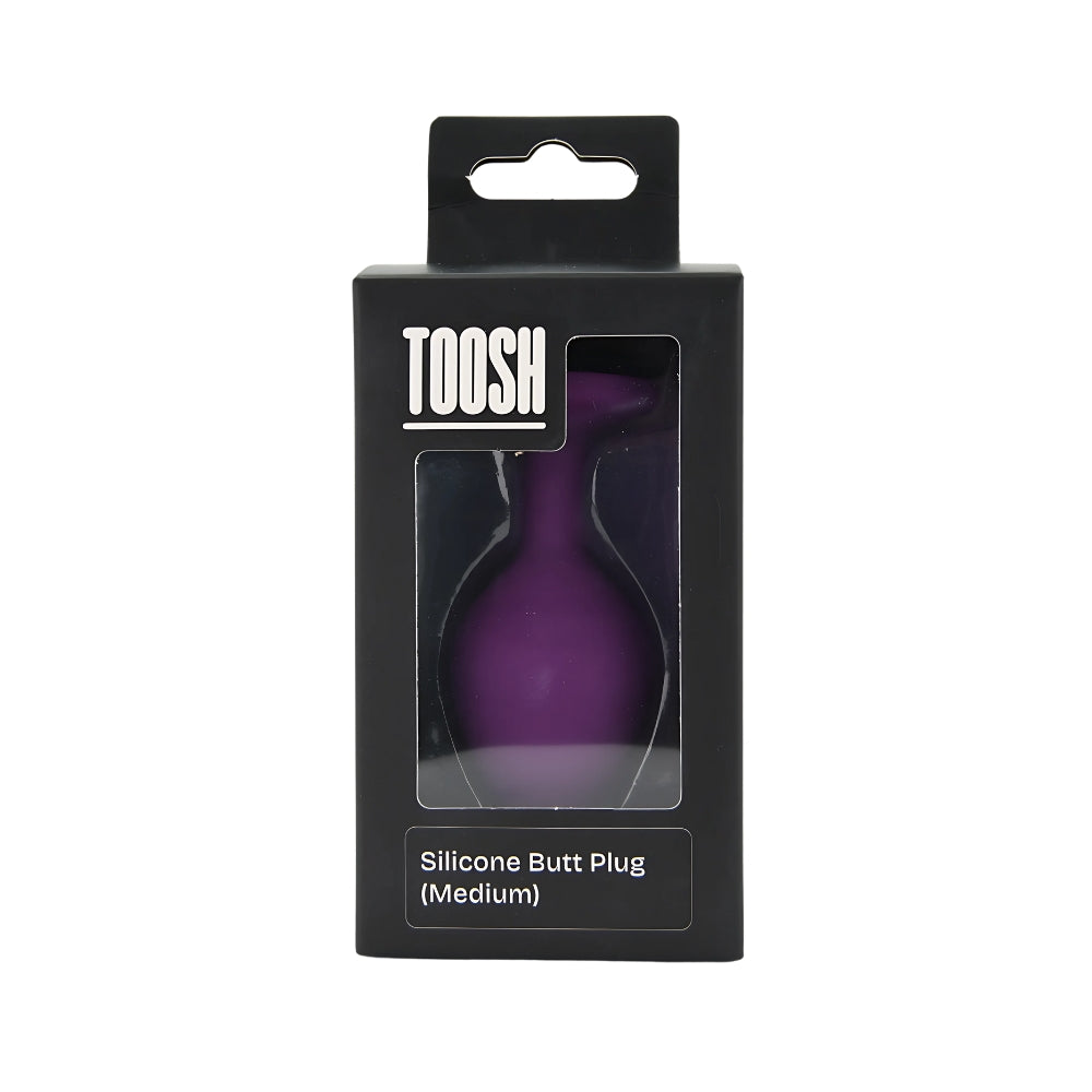 Toosh purple silicone butt plug in medium size, smooth and tapered for comfortable use, shown in packaging.