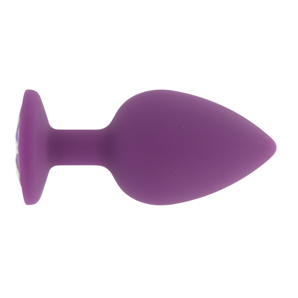 Large purple silicone butt plug from Toosh, showcasing its smooth, tapered design and vibrant color for comfortable use.