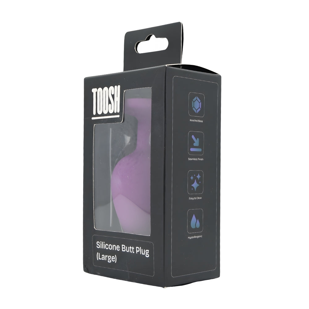 Large purple silicone butt plug by Toosh, featuring a smooth, tapered design for comfortable wear and easy insertion.