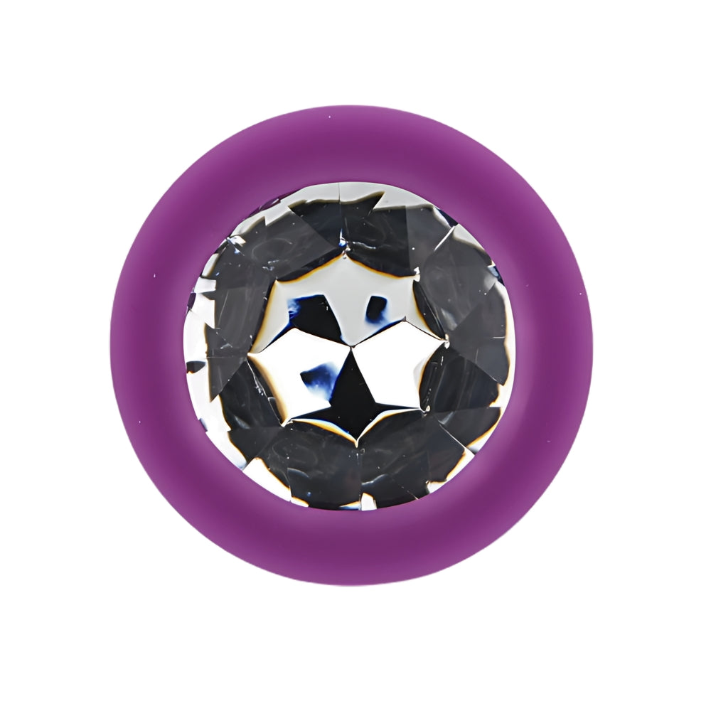 Large purple silicone butt plug from Toosh, smooth and phallic-shaped for adult pleasure, shown on a neutral background.