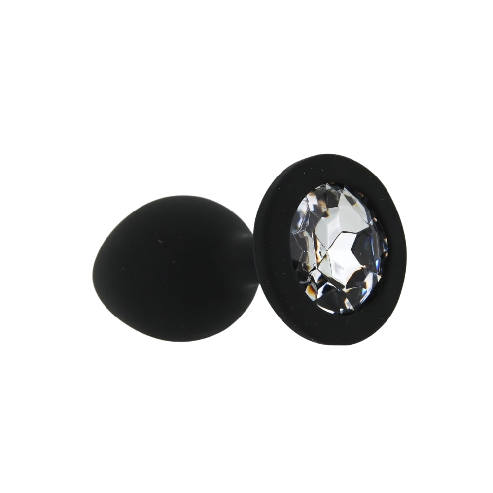 Small black silicone butt plug from Toosh, featuring a smooth, tapered design for comfortable insertion and secure fit.