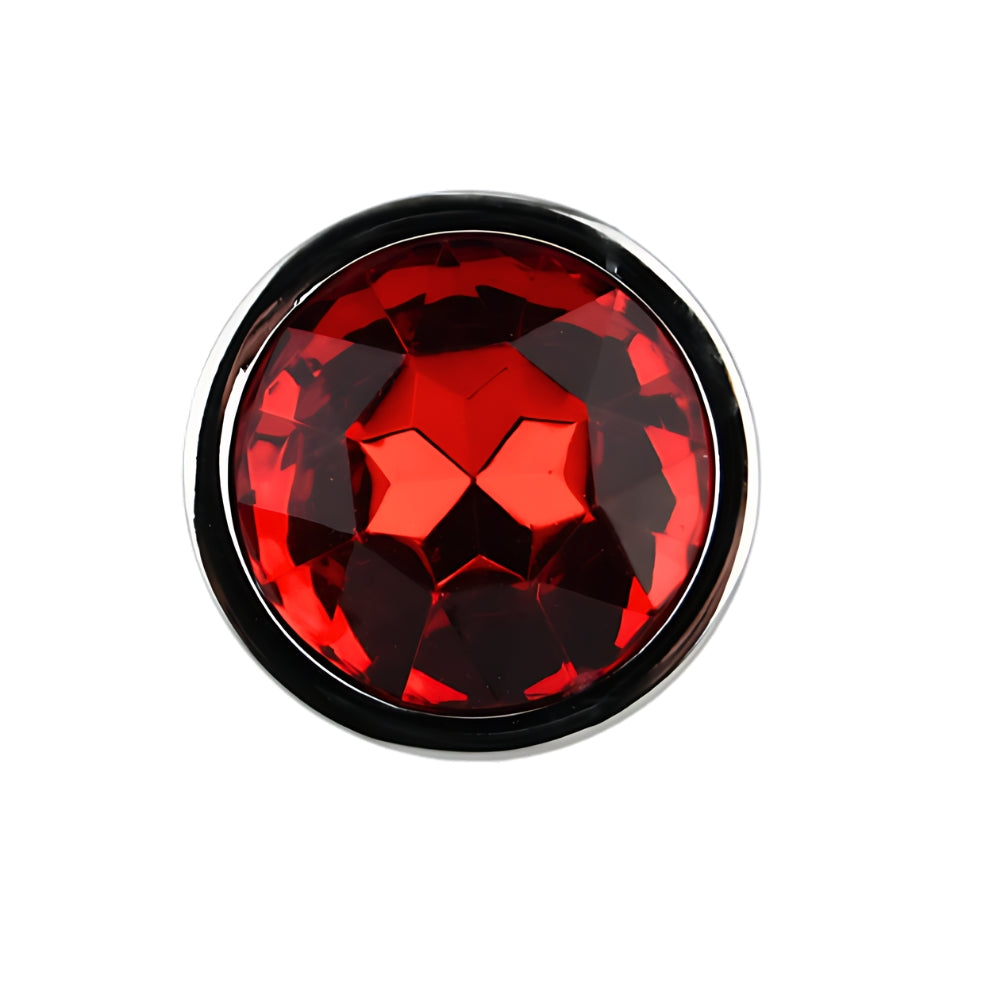 Toosh small silver metal butt plug with red gemstone jewel, smooth and polished for comfortable use.