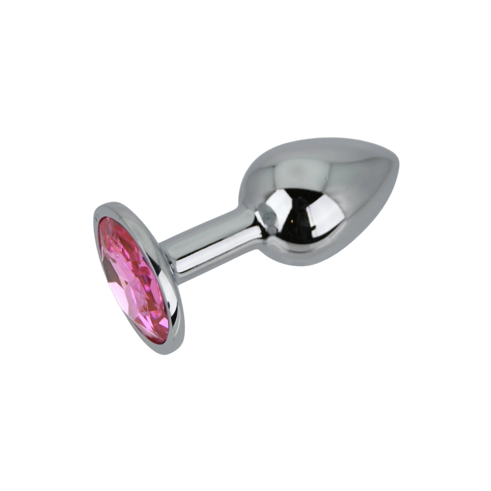 Toosh small silver metal butt plug with pink stone detail, smooth shape and tapered tip for comfortable use.