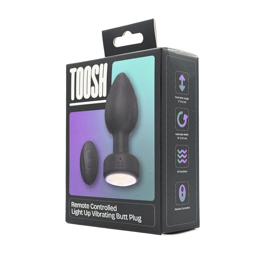 Toosh remote-controlled light-up vibrating butt plug with smooth design and anal bead shape, displayed in packaging.