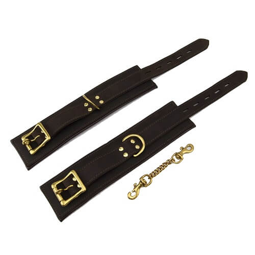 Bound Nubuck Leather Wrist Restraints showing padded leather cuffs with adjustable straps and metal buckle closures.