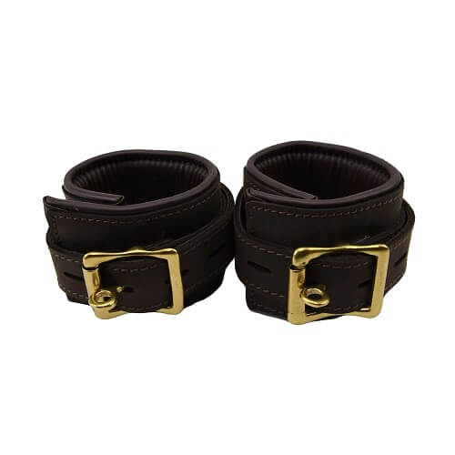 Bound Nubuck Leather Wrist Restraints for bondage, featuring padded cuffs and adjustable straps for comfort and security.