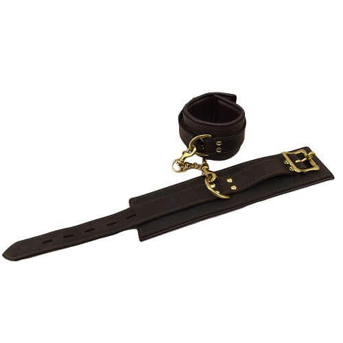 Bound Nubuck Leather Wrist Restraints with adjustable straps and metal hardware for BDSM bondage play.