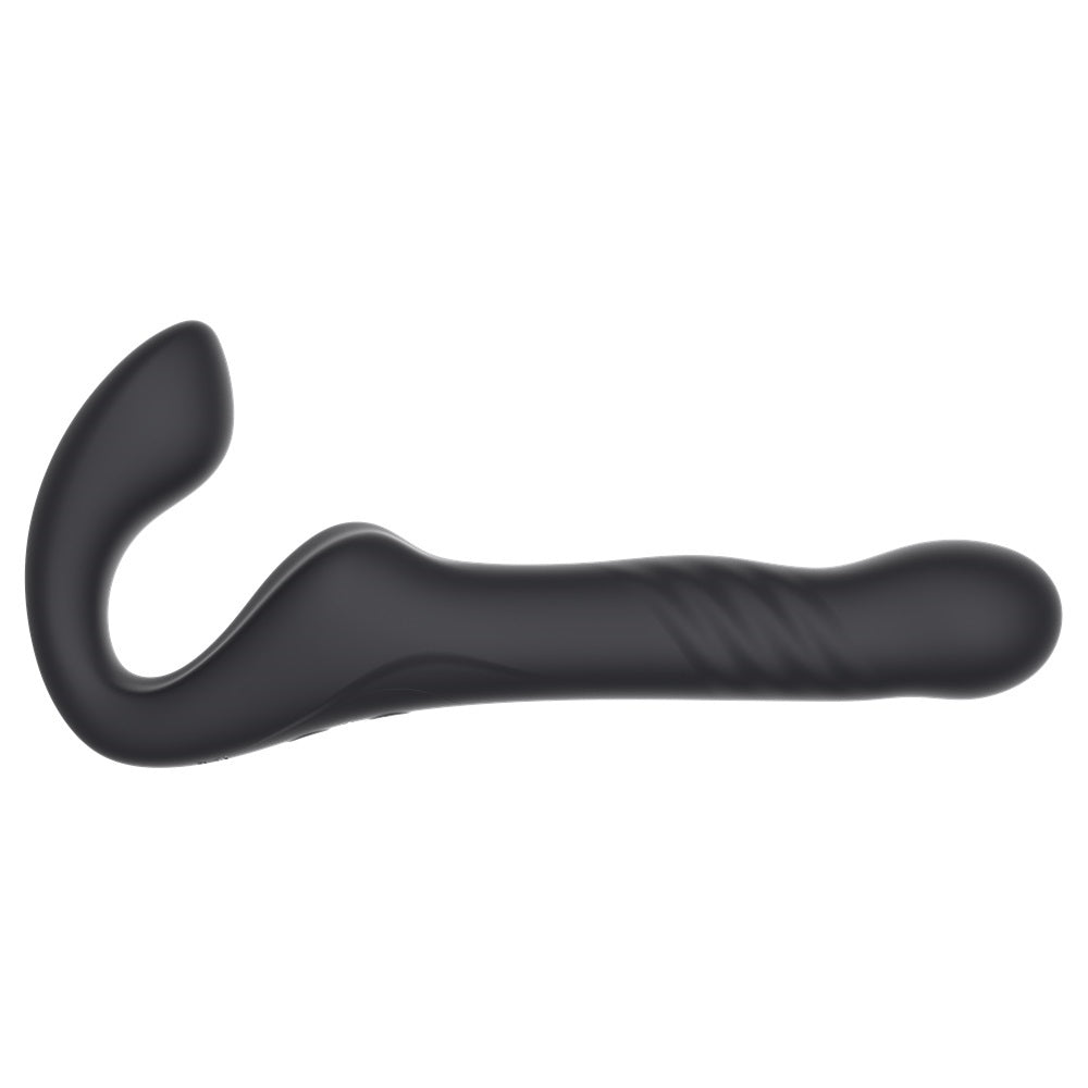 MINA Surge remote vibrating strapless strap-on shown in black, featuring thrusting and vibrating functions for adult pleasure.
