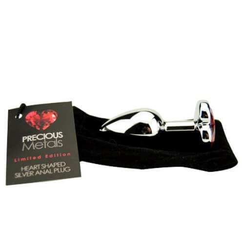 Silver heart-shaped butt plug by Precious Metals, featuring a sleek design and smooth finish for comfortable use.